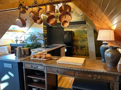 Cuisine ou kitchenette dans l'établissement Holiday home Haras du Ry
