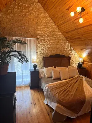 Un ou plusieurs lits dans un hébergement de l'établissement Holiday home Haras du Ry