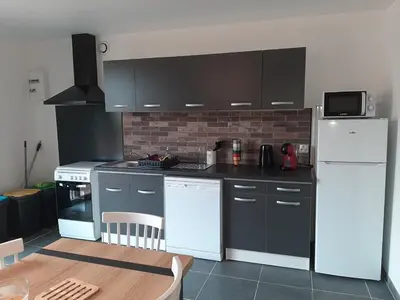 Cuisine ou kitchenette dans l'établissement Mulots et Bulots