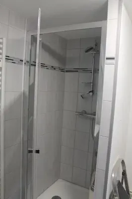 Salle de bains dans l'établissement le Cozy Bayeusain