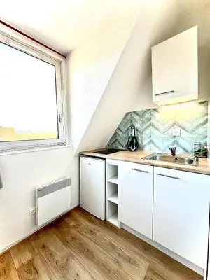 Cuisine ou kitchenette dans l'établissement Appartement Douillet - Vue Mer - Piscine/ Tennis
