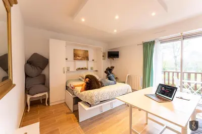 Télévision ou salle de divertissement dans l'établissement STUDIO COSY