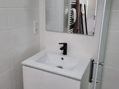 Salle de bains dans l'établissement Gîte LES DUNES 47C