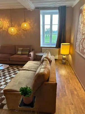 Coin salon dans l'établissement Un mouton dans l'eglise