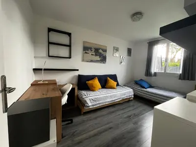 Coin salon dans l'établissement Maison HERMANVILLE SUR MER plein pied-à côté de la plage