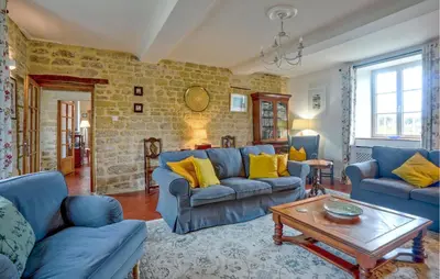 Coin salon dans l'établissement Cozy Home In Appeville