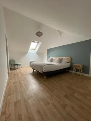 Un ou plusieurs lits dans un hébergement de l'établissement Ducey Appart'Hôtel - Les Rivières