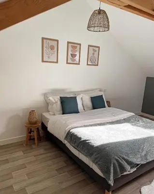 Un ou plusieurs lits dans un hébergement de l'établissement Ducey Appart'Hôtel - Les Rivières