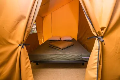 Un ou plusieurs lits dans un hébergement de l'établissement Camping Onlycamp Sous les Pommiers
