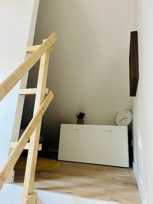 Un ou plusieurs lits dans un hébergement de l'établissement Cocon Maritime 1 chambre & 1 Mezzanine