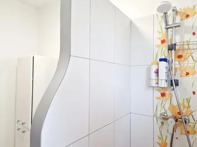 Salle de bains dans l'établissement Les Capucines