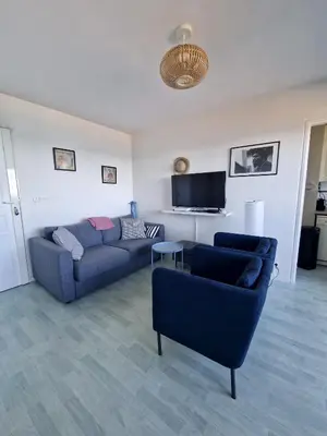 Télévision ou salle de divertissement dans l'établissement Duplex vue sur mer
