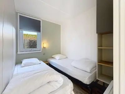 Un ou plusieurs lits dans un hébergement de l'établissement Mobil-home 4* Grand Confort, 200m plage, piscine, fitness, parking, ménage inclus, Wi-Fi gratuit - FR-1-361A-75