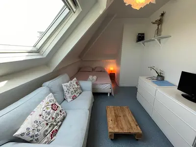 Télévision ou salle de divertissement dans l'établissement Studio Cosy avec Parking Privé