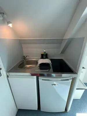 Cuisine ou kitchenette dans l'établissement Studio Cosy avec Parking Privé