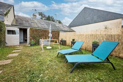 Jardin de l'établissement Au Jardin de Mel - Appt à moins d'1 km de la plage