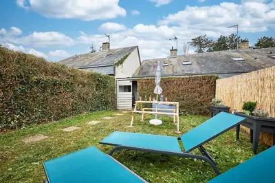 Jardin de l'établissement Au Jardin de Mel - Appt à moins d'1 km de la plage