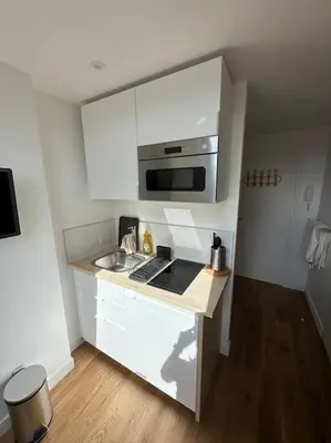 Cuisine ou kitchenette dans l'établissement Studette entièrement rénovée et lumineuse