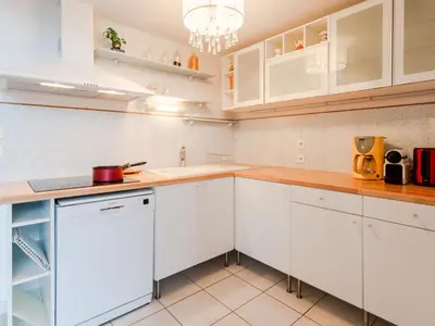 Cuisine ou kitchenette dans l'établissement Apartment Les Lofts-17 by Interhome