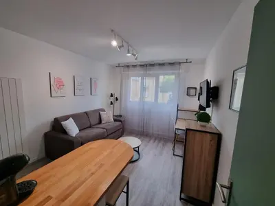 Télévision ou salle de divertissement dans l'établissement Echappée en bord de mer - studio à la plage !
