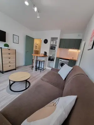 Coin salon dans l'établissement Echappée en bord de mer - studio à la plage !