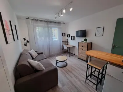 Télévision ou salle de divertissement dans l'établissement Echappée en bord de mer - studio à la plage !