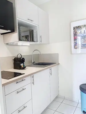 Cuisine ou kitchenette dans l'établissement CABOURG - 2 PIÈCES avec Balcon et parking- Hyper Centre et Plage