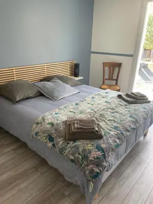 Un ou plusieurs lits dans un hébergement de l'établissement Villa les hortensias