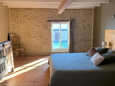 Un ou plusieurs lits dans un hébergement de l'établissement Gîte de groupe agritourisme 3 gîtes mitoyens 25 couchages Convivialité et intimité