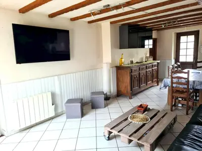 Coin salon dans l'établissement Grande maison conviviale à Flamanville avec jardin clos