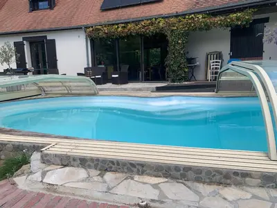 Piscine de l'établissement GITE Au Dessus des Pâquerettes ou située à proximité