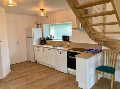 Cuisine ou kitchenette dans l'établissement Rive gauche (bord de mer)