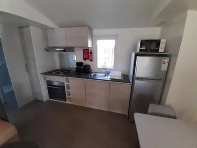 Cuisine ou kitchenette dans l'établissement litteau 213