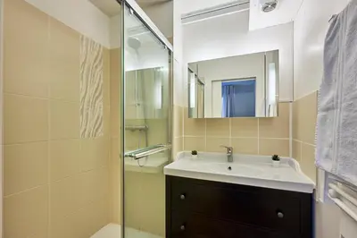 Salle de bains dans l'établissement Les Violettes - Appt à 200 m de la plage