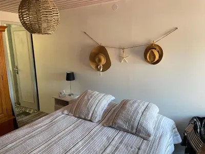 Un ou plusieurs lits dans un hébergement de l'établissement Petite maison dans la manche