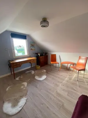 Coin salon dans l'établissement L'Océan, maison avec jardin clos