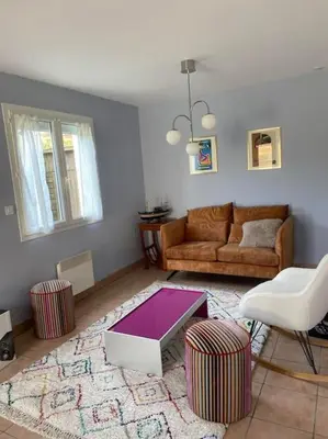 Coin salon dans l'établissement L'Océan, maison avec jardin clos