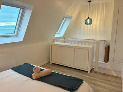 Un ou plusieurs lits dans un hébergement de l'établissement Horizon plage