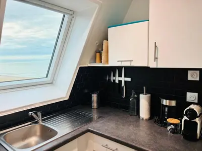 Cuisine ou kitchenette dans l'établissement Horizon plage