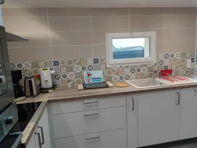Cuisine ou kitchenette dans l'établissement Gîte de Cantilly meublé de tourisme 3 étoiles ***