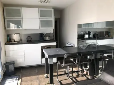 Cuisine ou kitchenette dans l'établissement Cocoloclouvigny
