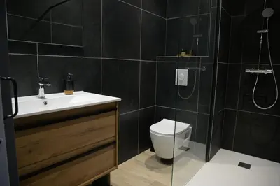 Salle de bains dans l'établissement La Tanière de la baie - Maison 6-8 pers