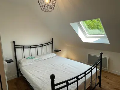 Un ou plusieurs lits dans un hébergement de l'établissement Maison de Léopold - gîte de groupe - 15 couchages