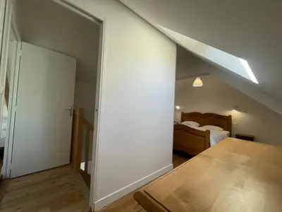 Un ou plusieurs lits dans un hébergement de l'établissement Maison de Léopold - gîte de groupe - 15 couchages