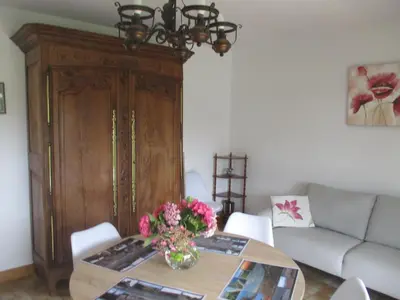 Coin salon dans l'établissement GITE LE LILAS