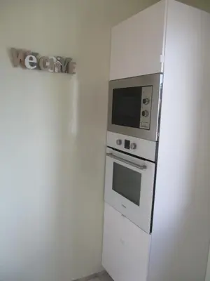 Cuisine ou kitchenette dans l'établissement GITE LE LILAS