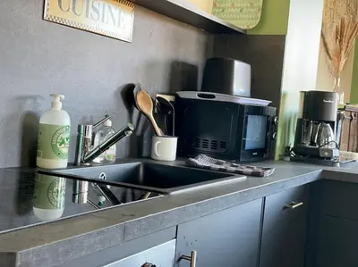 Cuisine ou kitchenette dans l'établissement L'Atelier Saint-Martin by Melrose