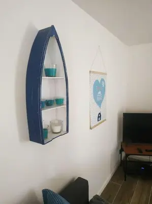 Télévision ou salle de divertissement dans l'établissement Le gîte du havre