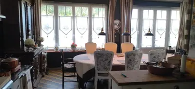 Coin salon dans l'établissement Une chambre en ville