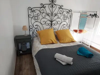 Un ou plusieurs lits dans un hébergement de l'établissement Gîte la Beautėe
